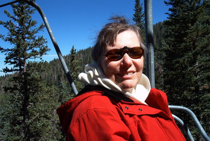 June.jpg - Donna (my wife) on the lift at Snowbowl Ski Area.  This is NOT during ski season.